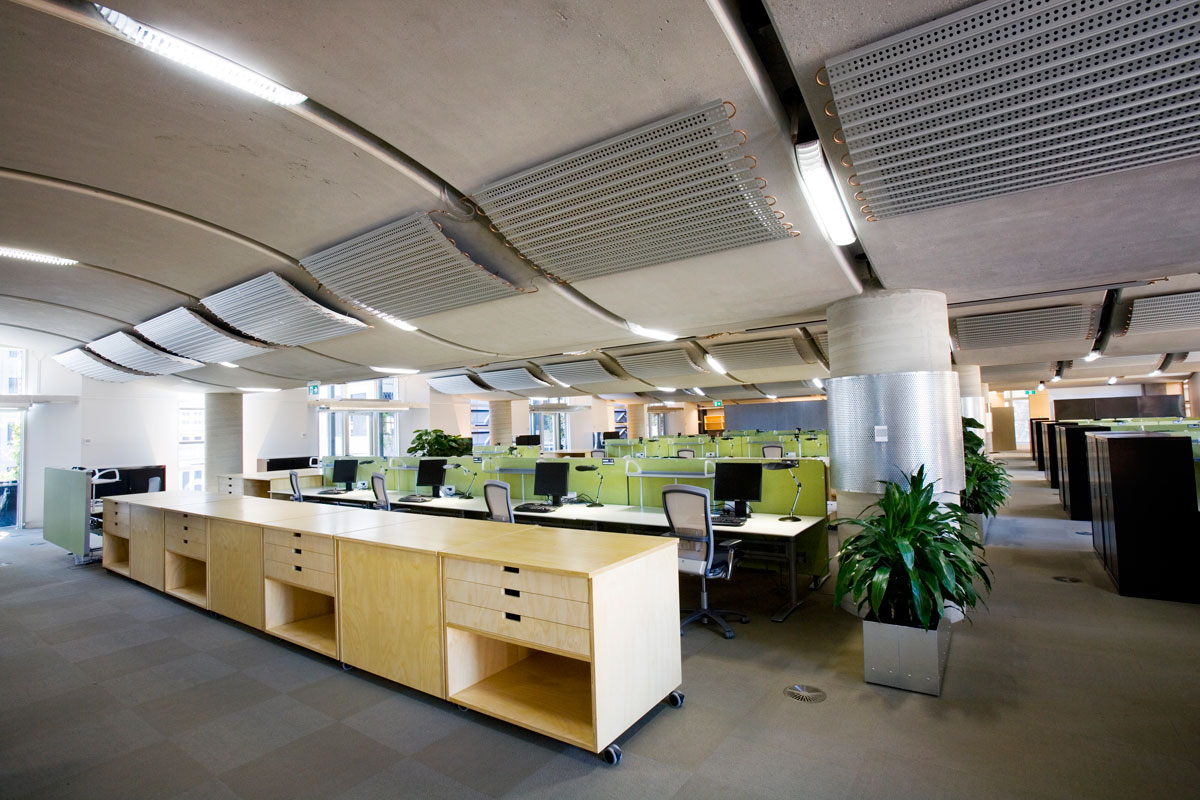 Undulating ceiling panels over an open office space