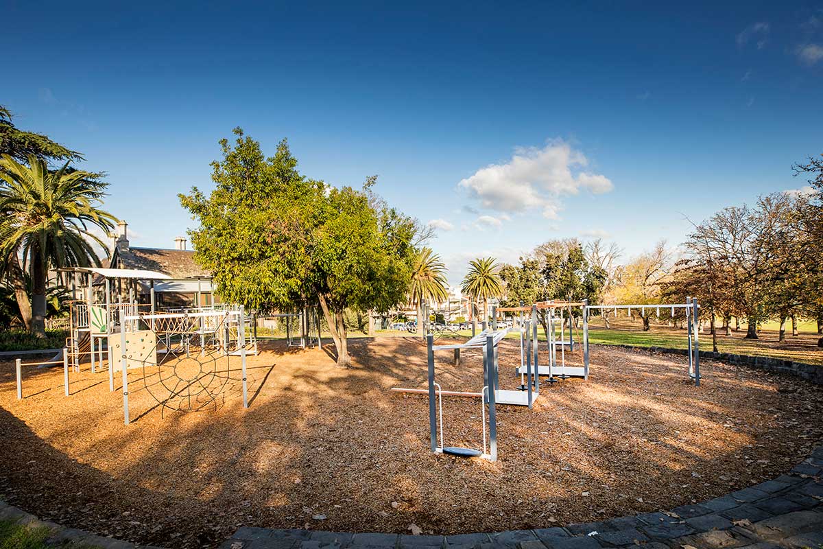 One of Fawkner Park's playgrounds with a range of play and fitness equipment.