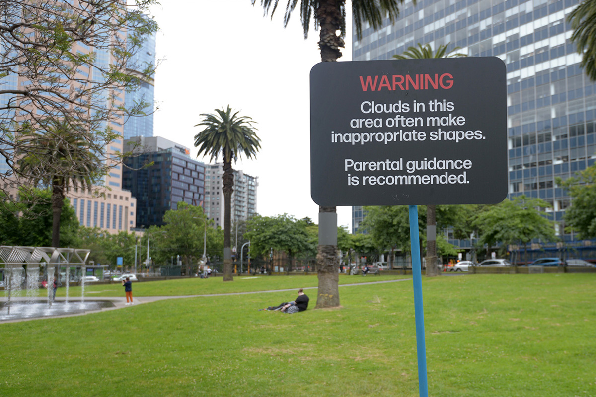 A sign in a city park that reads “Warning, clouds in this area often make inappropriate shapes. Parental guidance recommended.”