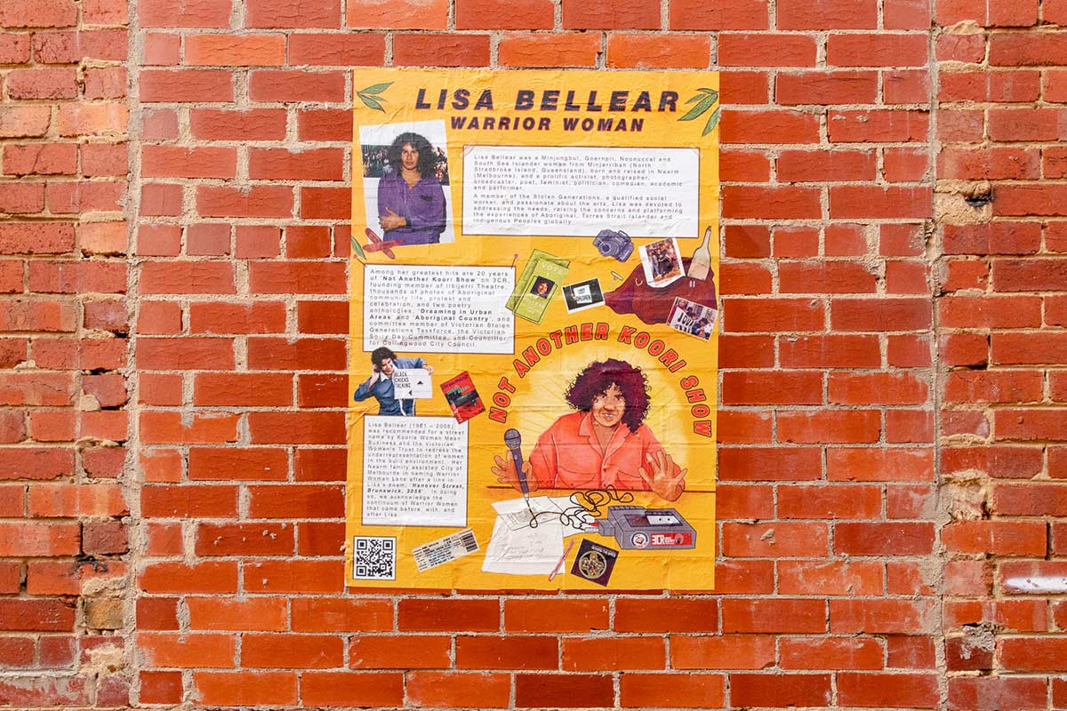 Artwork of Lisa Bellear attached to brick wall.