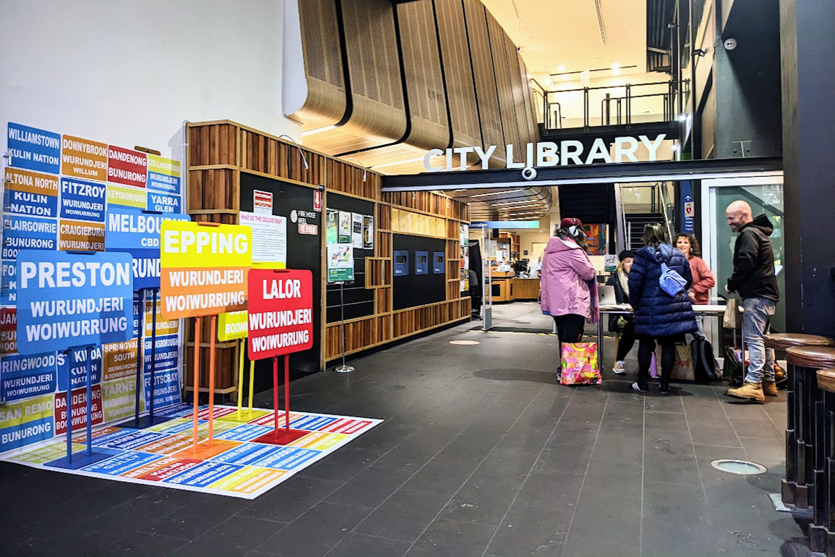 Signs in foyer of Melbourne City Library
